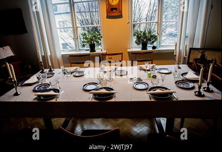 set table waiting for eight guests Stock Photo