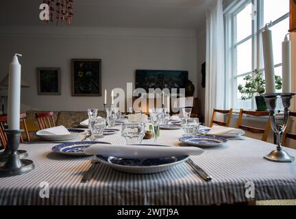set table waiting for eight guests Stock Photo