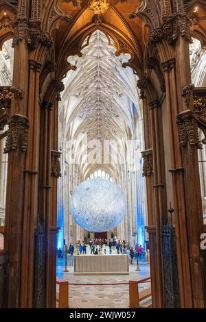 16th February 2024. The Museum of the Moon artwork by UK artist Luke Jerram is currently on display in Winchester Cathedral, Hampshire, England, UK.  The large-scale art installation has been touring the globe. It is attracting many visitors at the cathedral, and a number of events are planned while it is on show here. Stock Photo