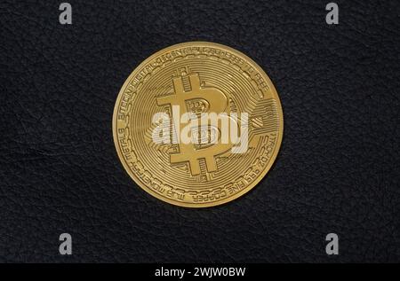 Bitcoin coin on black background Stock Photo