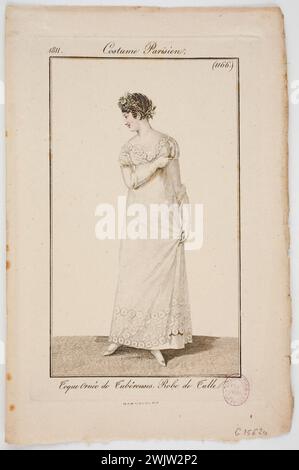 Toque adorned with tuberers. Tulle dress ', Parisian costume (extract from the Journal des Dames et des Modes), 1811, engraving n ° 1166. Watercolor stamp. 1811. Galliera, fashion museum of the city of Paris. 60785-13 Parisian suit, lace, watercolor print, ladies and fashions newspaper, female fashion, female model, number 1166, ornament, tulle dress, toque, tuberous Stock Photo