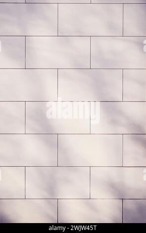 old brick wall background. Brickwork or stonework interior concrete grid uneven bricks design stack. orange brick wall background.Pattern of red brick Stock Photo