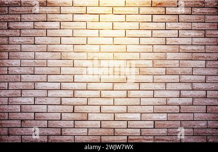Brick wall with spotlight, texture background, wallpaper. Empty scene background. Background of old brick wall, spotlight. Dark brick wall illuminated Stock Photo