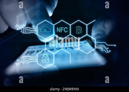 Businessman hands using mobile phone and virtual hexagons hologram with digital business icons. Virtual reality and global networking concept. Stock Photo