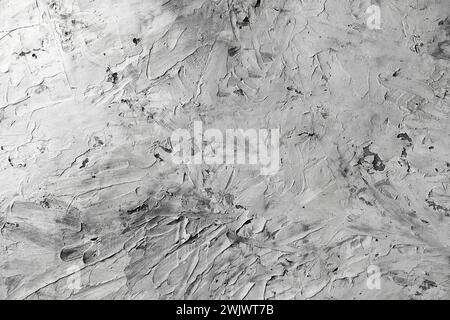 Soft focus image. Wall grunge dark grey concrete with light background. Dirty wall concrete blackboard texture and splash or abstract background. Stock Photo