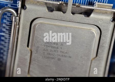 Cairo, Egypt, February 9 2024: Intel processor or processing unit, an electrical component (digital circuit) that performs operations on an external d Stock Photo