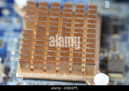 A closeup of a computer main board electronic motherboard, the main printed circuit board (PCB) in general-purpose computers and other expandable syst Stock Photo