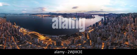 (240217) -- GUANGZHOU, Feb. 17, 2024 (Xinhua) -- An aerial drone photo taken on Aug. 7, 2019 shows a view of the Victoria Harbour in Hong Kong, south China. The Guangdong-Hong Kong-Macao Greater Bay Area, a city cluster, is one of the most open areas in China with economic vitality.   The greater bay area is composed of nine cities in Guangdong Province including Guangzhou, Shenzhen, Zhuhai, Foshan, Huizhou, Dongguan, Zhongshan, Jiangmen and Zhaoqing, and two special administrative regions of Hong Kong and Macao. (Photo by Qiu Huo/Xinhua) Stock Photo