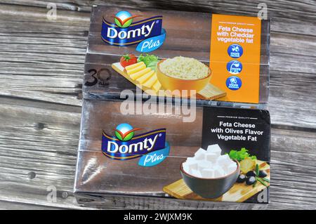 Cairo, Egypt, February 12 2024: Domty feta cheese plus cheddar, olives flavor, produced using pasteurized cow and buffalo milk, can be used to add a c Stock Photo