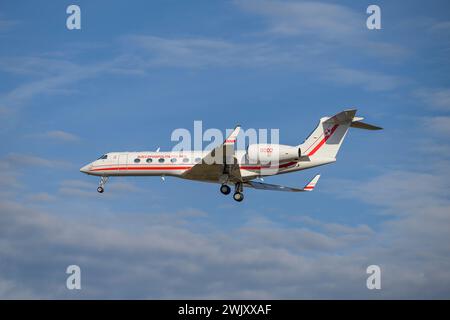 Munich, Germany - February 16. 2024 :  Polish Air Force Gulfstream G550  with the aircraft registration 0002  lands as part of the Munich Security Con Stock Photo