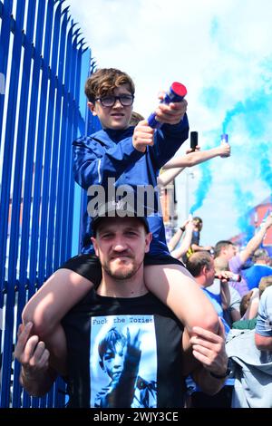 Everton fans demonstrate against the 10 point deduction imposed on the club for breaking PSR Rules. Stock Photo