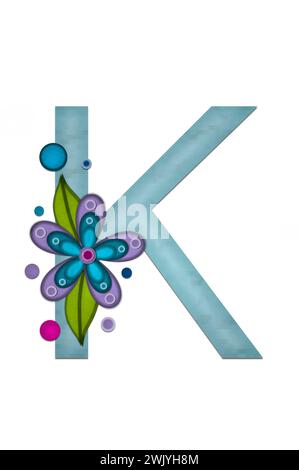 Teal colored letter K, paper style letters are decorated with colorful flowers.  Circles and polka dots are sprinkled on letter. Stock Photo