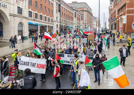 Leeds, UK. 17 FEB, 2024. Pro Palestine protestors march through the city center in Leeds as they escorted by police officers. Credit Milo Chandler/Alamy Live News Stock Photo