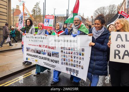Leeds, UK. 17 FEB, 2024. Members of Health workers for palestine, including members wearing scrubs and gowns, march through the streets of leeds as part of pro palestine demonstration. Credit Milo Chandler/Alamy Live News Stock Photo