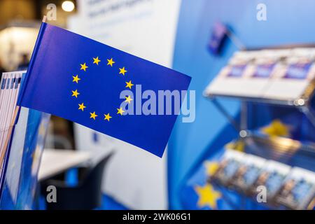 Augsburg, Bavaria, Germany - February 2, 2024: Flag of the European Union at a trade fair stand at the AFA trade fair in Augsburg *** Fahne der Europäischen Union an einem Messestand auf der AFA Messe in Augsburg Stock Photo