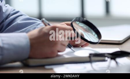 Checking documentation and reports for a business report Stock Photo