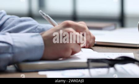 Checking documentation and reports for a business report Stock Photo