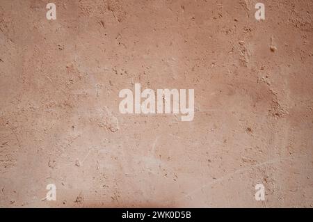 Old wall clay texture background. Vintage or grungy texture background. clay background with a texture of yellow wall. Grunge texture. Cracked wall ba Stock Photo