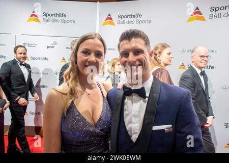 17 February 2024, Hesse, Frankfurt/Main: Gymnast Lukas Dauser and his wife Viktoria are coming to the 2024 Sports Ball in Frankfurt's Festhalle. Photo: Helmut Fricke/dpa Stock Photo