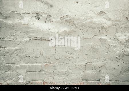 stained brick wall background. Brickwork flooring interior rock old pattern clean concrete grid uneven bricks design stack.  brick wall background. Pa Stock Photo