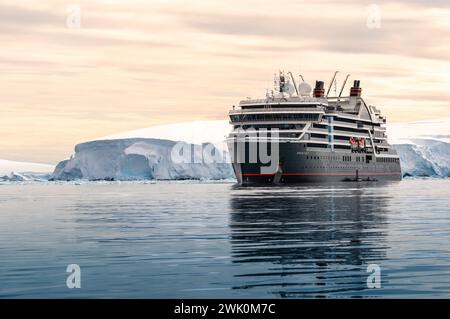 Fish Islands, Antarctica - January 13, 2024: Seabourn Pursuit expedition cruise ship in Antarctica. Stock Photo