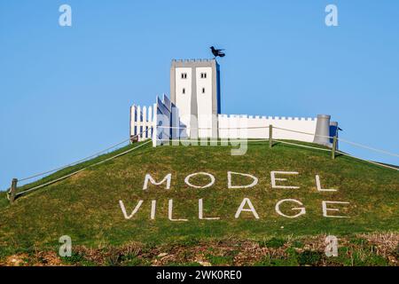 Advertisement for the Model Village, a popular attraction in Southsea, Portsmouth, Hampshire, a holiday resort on the Solent, south coast England Stock Photo