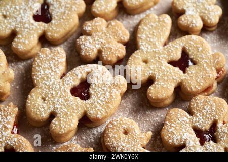 Linzer cookies in the shape of Easter bunnies and four leaf clovers, close up Stock Photo