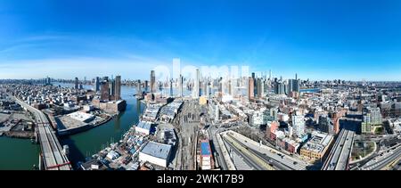 New York City skyline from Newtown Creek in Queens at the border between Brooklyn and Queens. Stock Photo