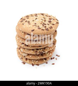 Stack of round cereal crackers with flax, sunflower, sesame seeds and ...