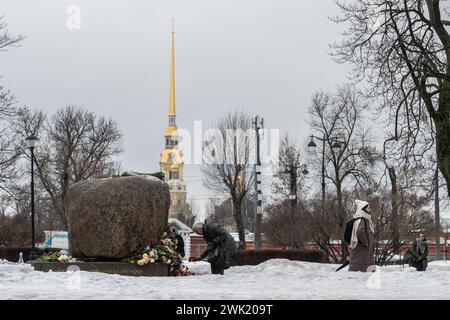 St. Petersburg, Russia. 17th Feb, 2024. People gather at a monument to victims of political repression to honor the memory of Russian opposition leader Alexei Navalny a day after news of his death, in St. Petersburg. Credit: SOPA Images Limited/Alamy Live News Stock Photo