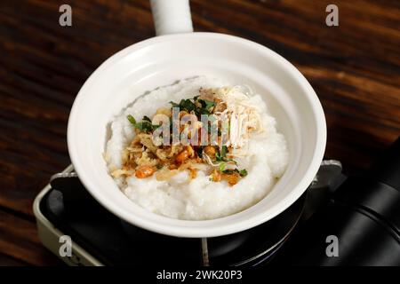 Chinese Claypot Chicken Porridge or Bubur Bakar, Asian Style Breakfast. Stock Photo