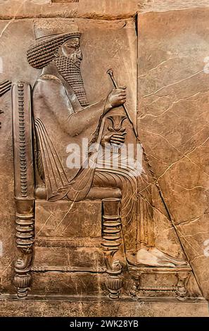 227. LIMESTONE RELIEF OF KING DARIUS SEATED ON THRONE,  PERSEPOLIS, CA. 5TH. C. BC. Stock Photo