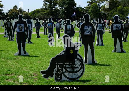 Sydney, Australia. 18th Feb, 2024. Thousands of people participated in a rally on February 18th in Central Sydney in support of Jewish Australians amidst rising antisemitism. The rally was organized by the Christian group Never Again Is Now. Antisemitic incidents have surged in Australia since the conflicts between Israel and Hamas broke out last October. At the site, there was an installation representing the hostages, with human-shaped stand-up banners symbolizing those taken by Hamas. Credit: George Chan/Alamy Live News Stock Photo