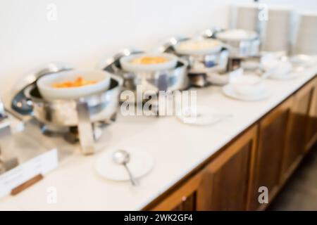 Many buffet heated trays in the hotel restaurant blur background Stock Photo