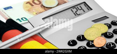 12,41 Euro minimum wage and calculator with German Flag Stock Photo