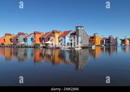 Colorful promenade and pier houses at the Reitdiephaven in Groningen. Stock Photo