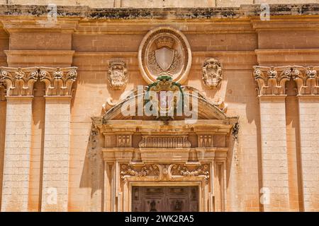 Detail of the portal and emblems of St. Paul's Cathedral in Mdina (Malta) Stock Photo