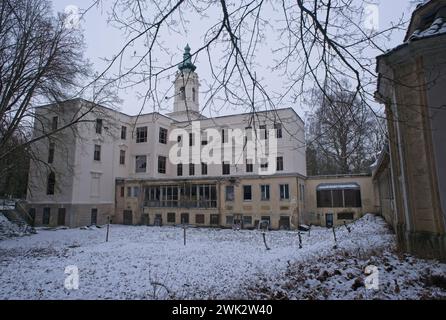 Wandlitz, Germany - Jan 17, 2024: SS chief Himmler took over in 1940 and used Schloss Dammsmuhle as his base and as an elegant boarding house. Cloudy Stock Photo