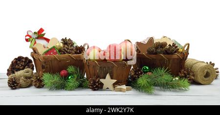 Christmas arrangement in a rustic style with natural elements. Cones tree branches, handmade toys, in baskets, balls, stars and hearts. isolation on a Stock Photo