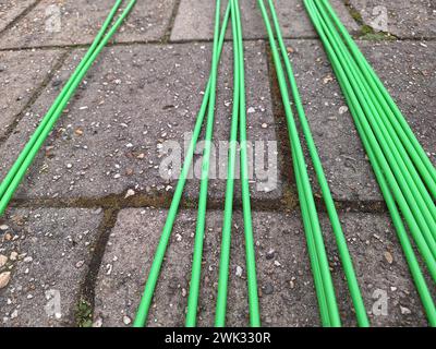 Fibre optic cables ready on the pavement to be buried for high-speed internet in the Netherlands Stock Photo