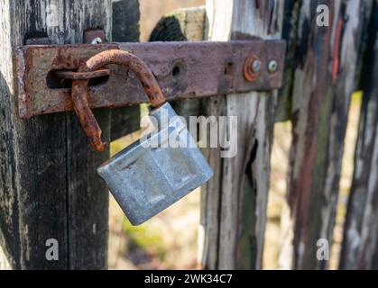 old rusty padlock on the door Stock Photo