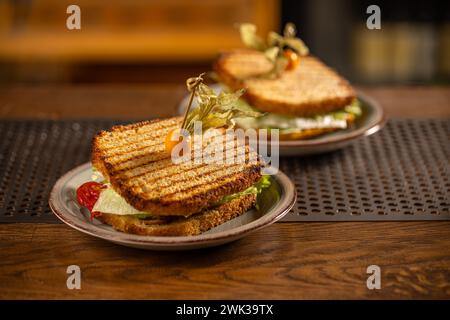 Healthy grilled sandwich toast with lettuce, cheese and tomato Stock Photo