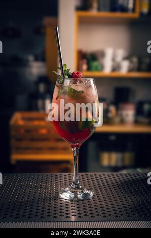 Cold summer cocktails drinks. Mocktail with raspberries, lime, mint and ice Stock Photo