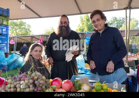 Market day on the Constanza Bastion of the Venetian city walls of Nicosia.Traders at their market stall. Stock Photo