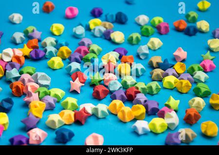 Paper folded into the shape of a 5-pointed star, multi-colored Stock Photo