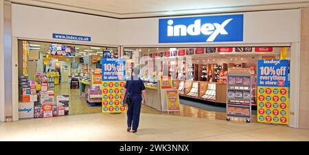 Archival historical 1999 Lakeside retail indoor shopping mall open plan entrance space back view model released woman customer walking towards catalogue retailer a business owned by Littlewoods from 1985 until 2005 West Thurrock Essex England UK Stock Photo