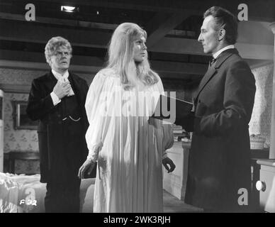 THORLEY WALTERS, SUSAN DENBERG and PETER CUSHING in a scene from FRANKENSTEIN CREATED WOMAN 1967 Director TERENCE FISHER Writer ANTHONY HINDS Costume Design ROSEMARY BURROWS and LARRY STEWART Music JAMES BERNARD A Hammer Film Production / Warner-Pathe Stock Photo