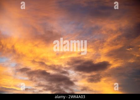 Beautiful sky background with clouds and sunset view wallpaper dramatic colors Stock Photo