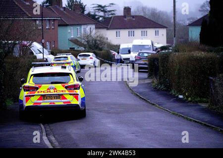 Police at the scene in Blaise Walk, in Sea Mills, Bristol, where a woman has been arrested on suspicion of murder after three children were found dead at a property. Picture date: Sunday February 18, 2024. Stock Photo
