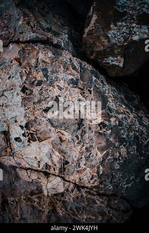 Light granite rock texture concept photo. Mountain rough surface. Close up stone background for design. Texture in nature for wallpaper. High quality Stock Photo